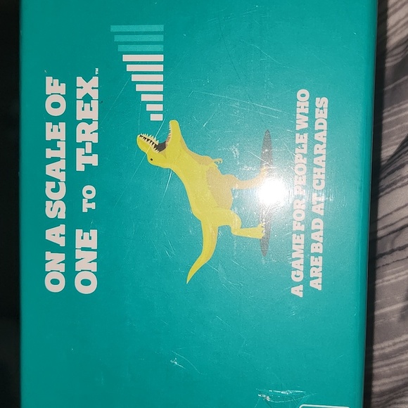 ON A SCALE FOR ONE TO T REX GAME - Picture 1 of 3